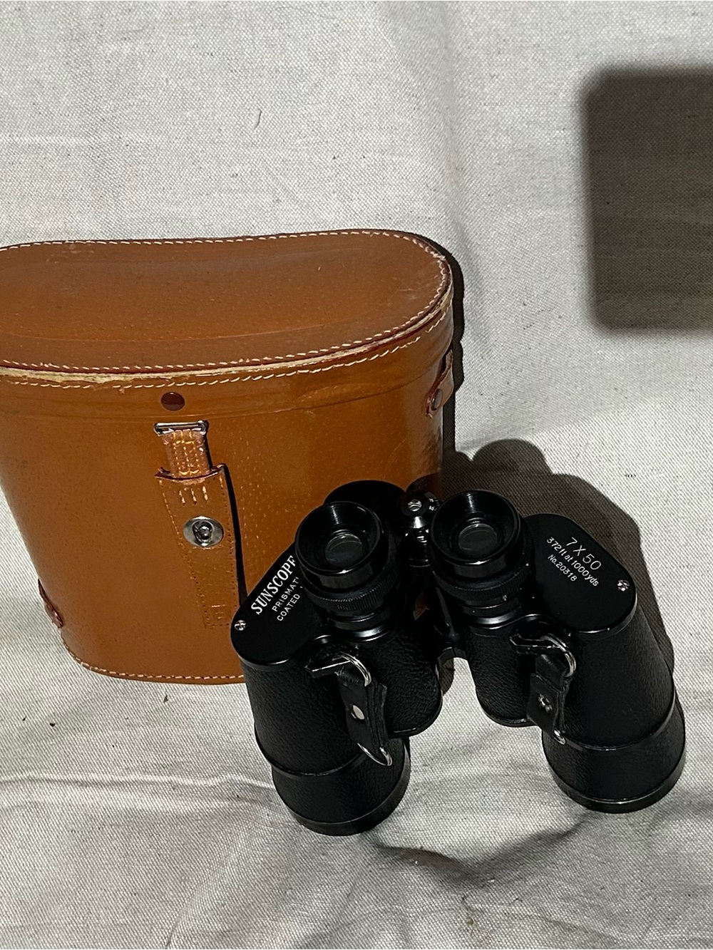 Mid century Sunscope binoculars. Original leather case .